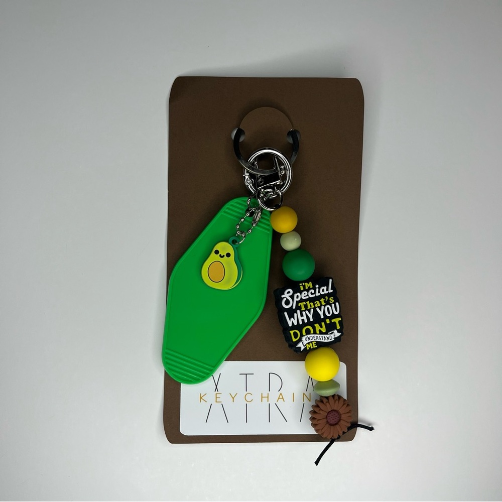 Green Avocado Keychain with Motel Tag Sunflower
